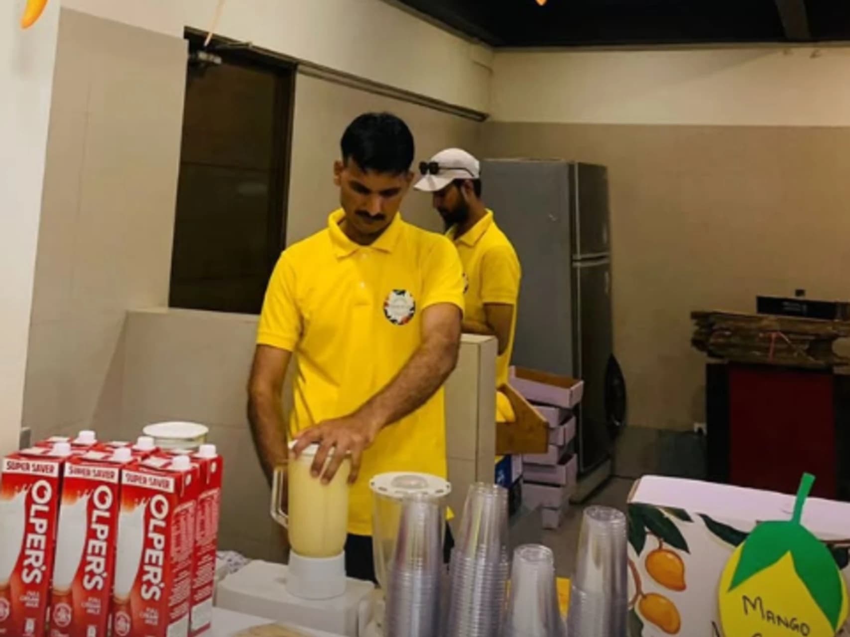 Team enjoying Mango Day at a corporate event