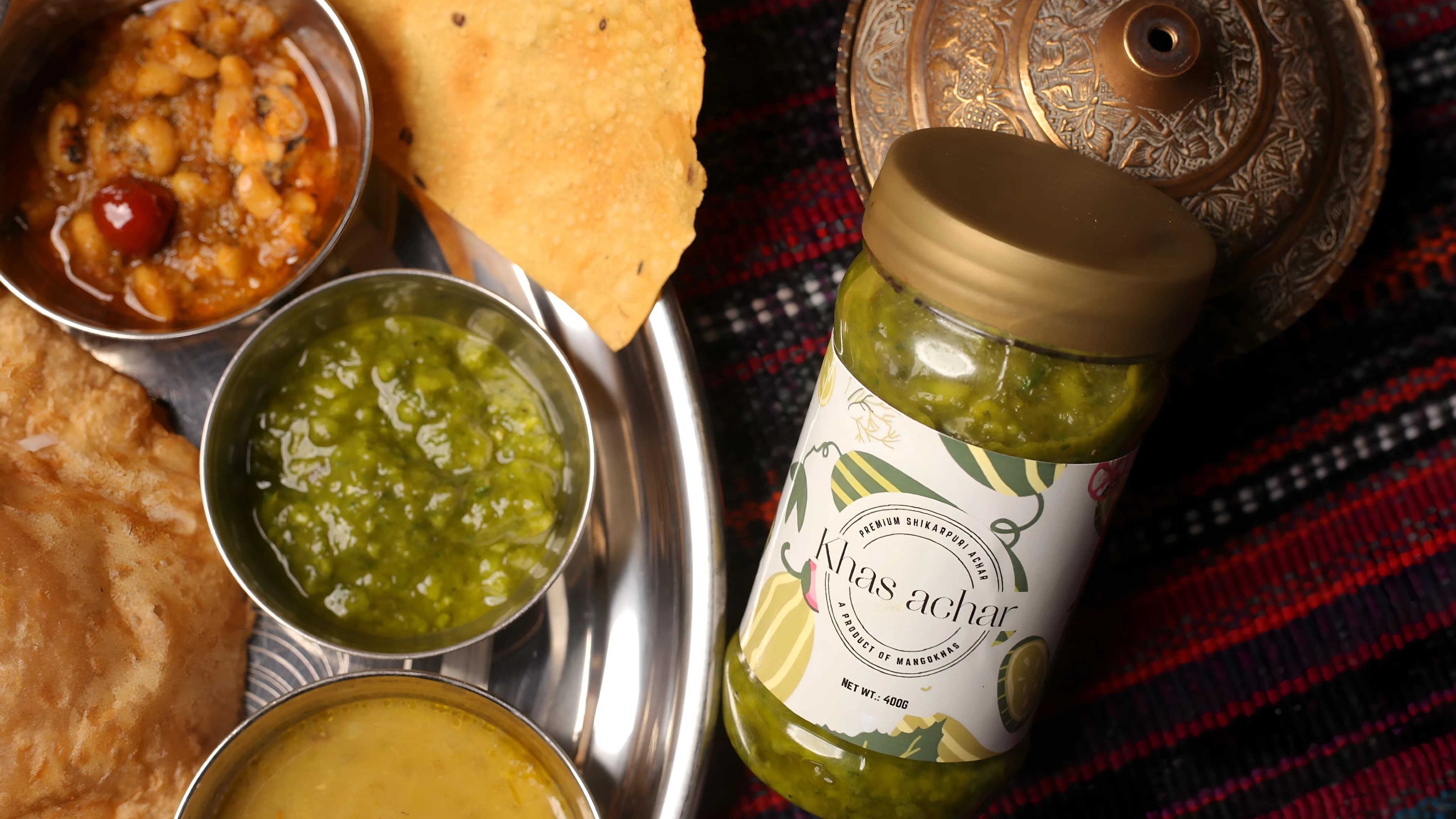 Traditional spicy Pakistani achaar in glass jars – Mangokhas